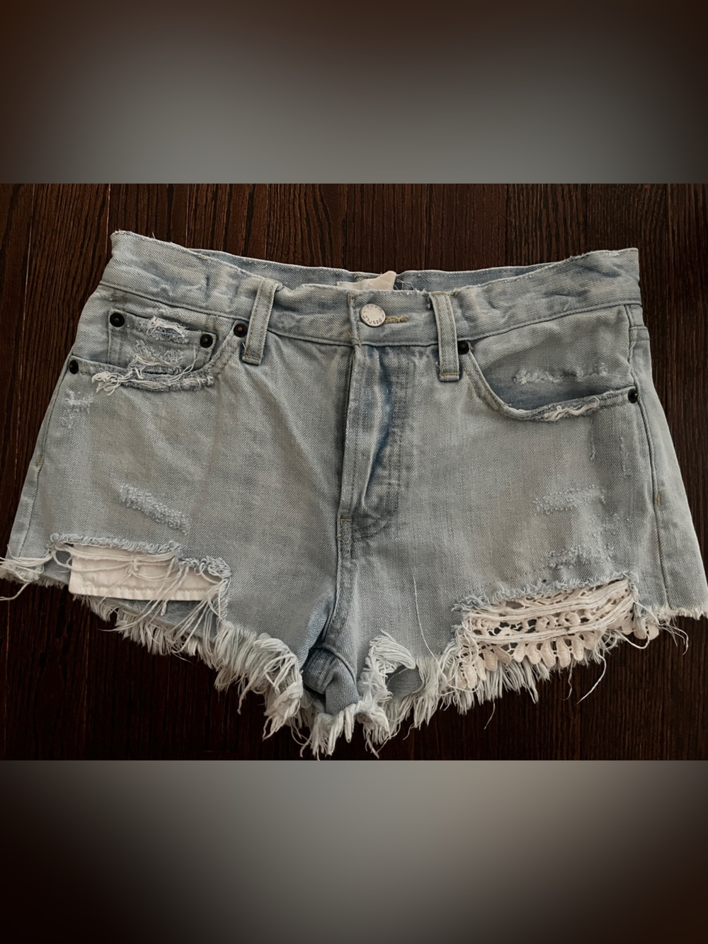 We The Free Light Blue Distressed Denim Shorts with Crochet